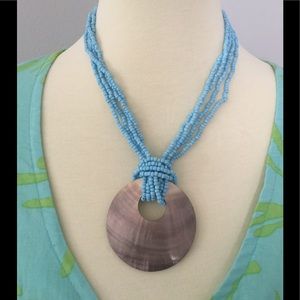 Blue Bead Shell Necklace button close